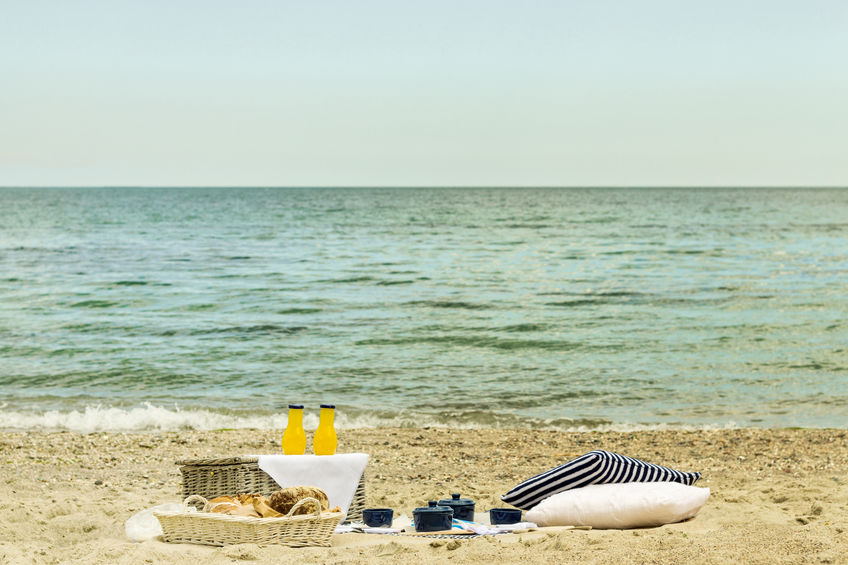 Summer picnic on the beach.